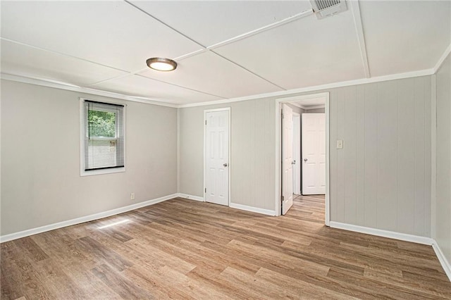 1186 Eastview Rd NE, Conyers, GA 30012 - unfurnished room with light wood-type flooring and ornamental molding
