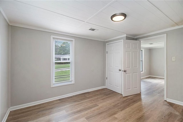 1186 Eastview Rd NE, Conyers, GA 30012 - spare room with wood finished floors and ornamental molding