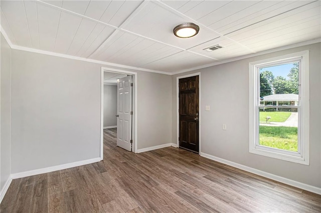 1186 Eastview Rd NE, Conyers, GA 30012 - empty room with wood finished floors, crown molding, and wood ceiling