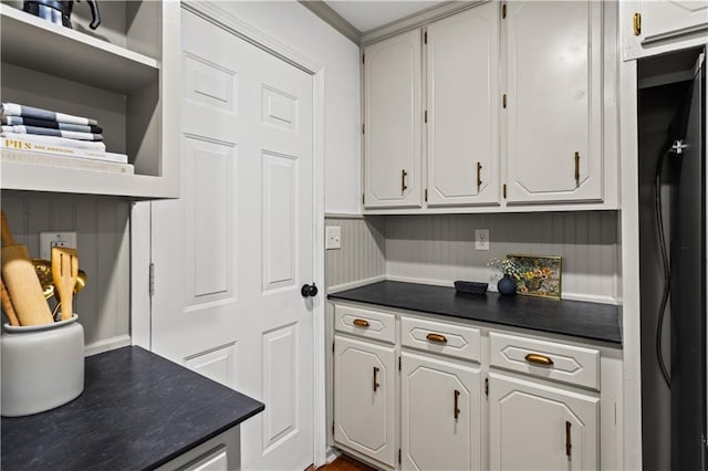1320 Country Acres Ln, Lawrenceville, GA 30045 - kitchen featuring dark countertops, fridge, and white cabinets