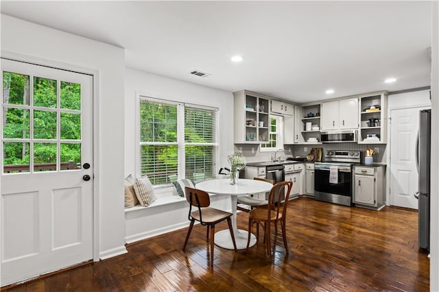 1320 Country Acres Ln, Lawrenceville, GA 30045 - dining space featuring dark wood finished floors and recessed lighting
