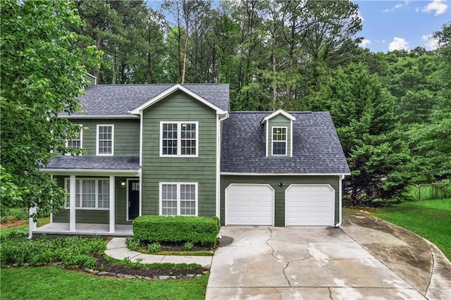 1320 Country Acres Ln, Lawrenceville, GA 30045 - view of front of house featuring concrete driveway, covered porch, a shingled roof, and a front lawn