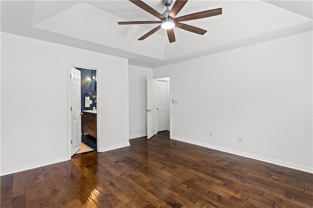 1320 Country Acres Ln, Lawrenceville, GA 30045 - unfurnished room with ceiling fan, dark wood finished floors, and a raised ceiling