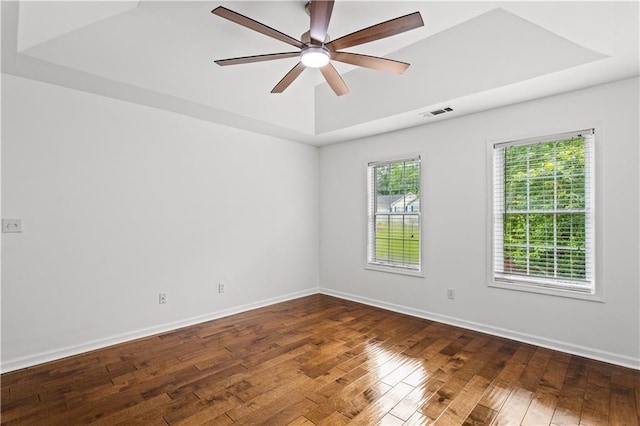 1320 Country Acres Ln, Lawrenceville, GA 30045 - empty room with a raised ceiling, wood-type flooring, and a ceiling fan