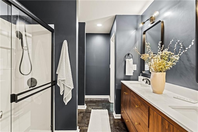 1320 Country Acres Ln, Lawrenceville, GA 30045 - bathroom featuring double vanity, a shower stall, and recessed lighting