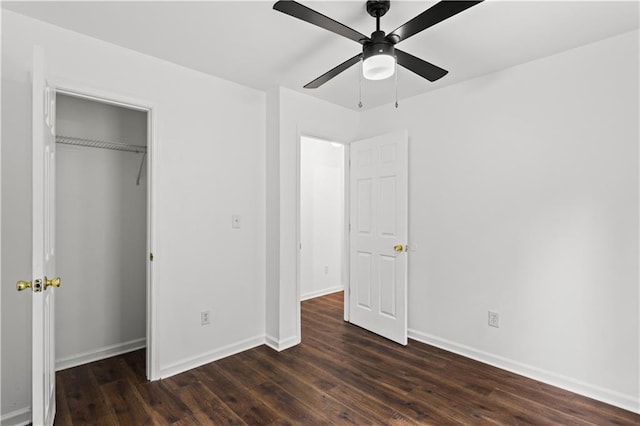 1320 Country Acres Ln, Lawrenceville, GA 30045 - unfurnished bedroom with dark wood-type flooring, a closet, and ceiling fan