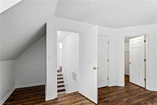 1320 Country Acres Ln, Lawrenceville, GA 30045 - bonus room featuring dark wood-style flooring and vaulted ceiling