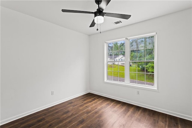1320 Country Acres Ln, Lawrenceville, GA 30045 - spare room with a ceiling fan and dark wood-style floors