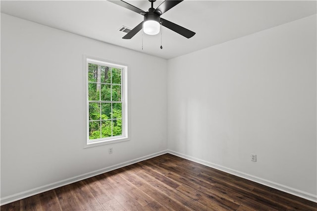 1320 Country Acres Ln, Lawrenceville, GA 30045 - empty room with plenty of natural light, dark wood-style flooring, and ceiling fan