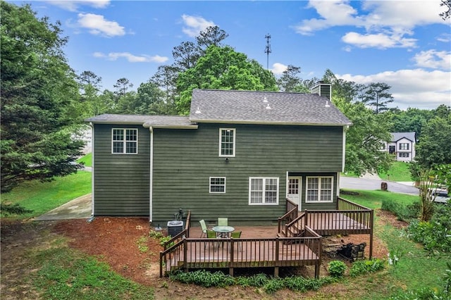 1320 Country Acres Ln, Lawrenceville, GA 30045 - rear view of house featuring a wooden deck and a chimney