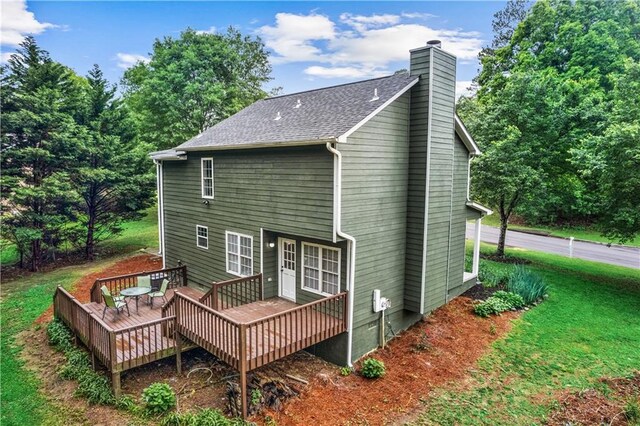 1320 Country Acres Ln, Lawrenceville, GA 30045 - rear view of property featuring a chimney, a deck, and a shingled roof