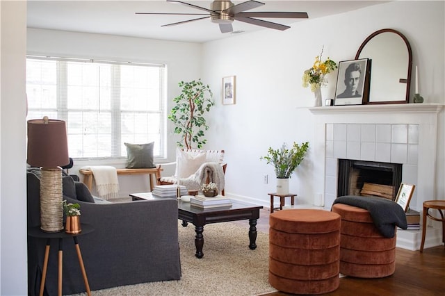 1320 Country Acres Ln, Lawrenceville, GA 30045 - living room with ceiling fan, a tiled fireplace, and wood finished floors