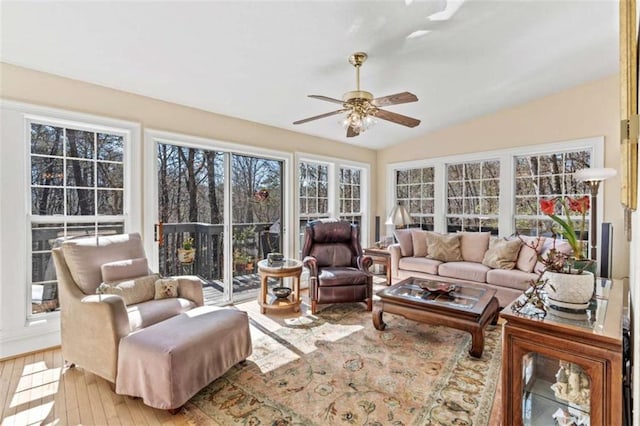 sunroom / solarium featuring vaulted ceiling and ceiling fan