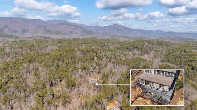 property view of mountains featuring a wooded view