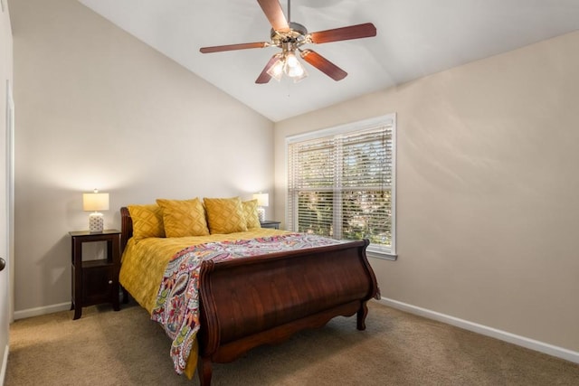 bedroom featuring vaulted ceiling, carpet floors, and baseboards