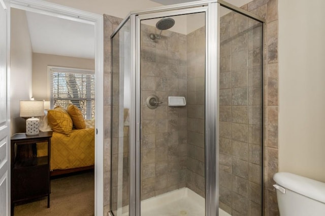 full bath with a shower stall and toilet