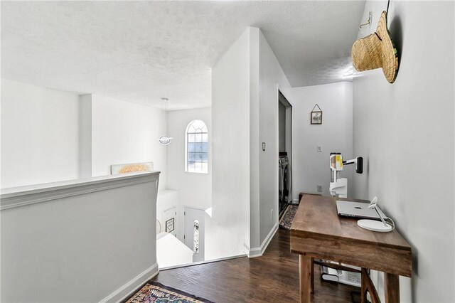 1240 Birchwood Ln, Roswell, GA 30076 - foyer featuring a textured ceiling, wood finished floors, and baseboards