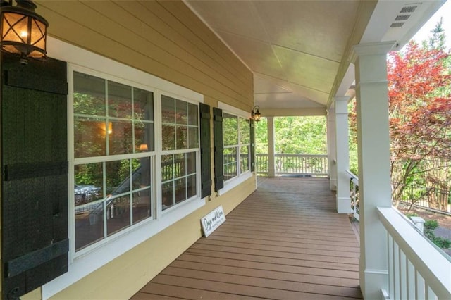 deck with covered porch