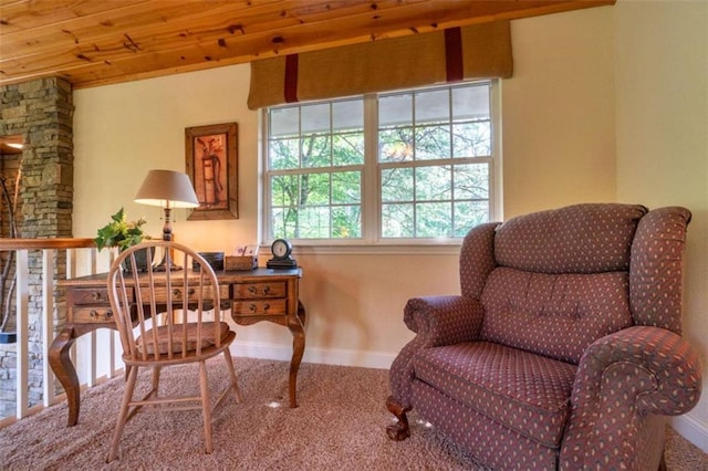 sitting room featuring wood ceiling and carpet floors