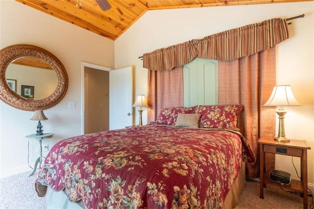 carpeted bedroom featuring ceiling fan, wooden ceiling, and vaulted ceiling