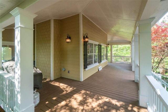 wooden deck featuring a porch