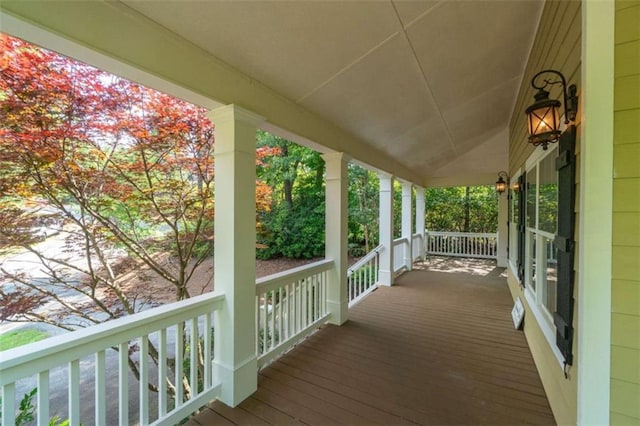 wooden deck featuring covered porch