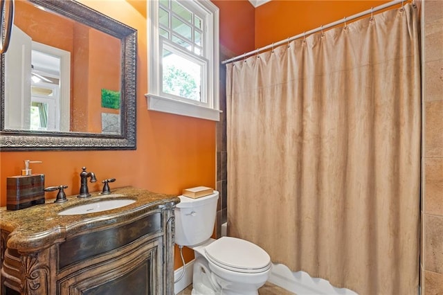 full bath with vanity, toilet, and a shower with shower curtain