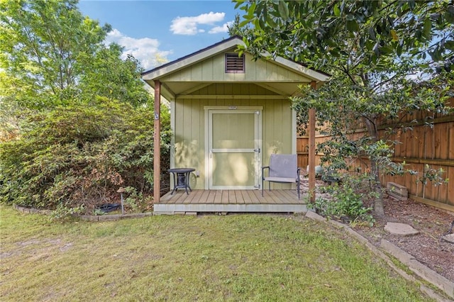 view of shed with fence