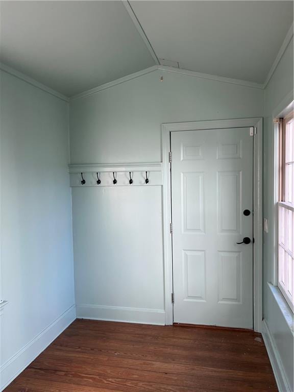 mudroom with crown molding, lofted ceiling, and dark wood-type flooring