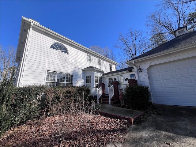 view of home's exterior with a garage