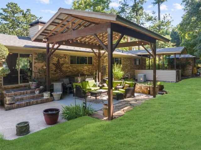 view of yard with central AC unit, a patio, a pergola, and outdoor lounge area