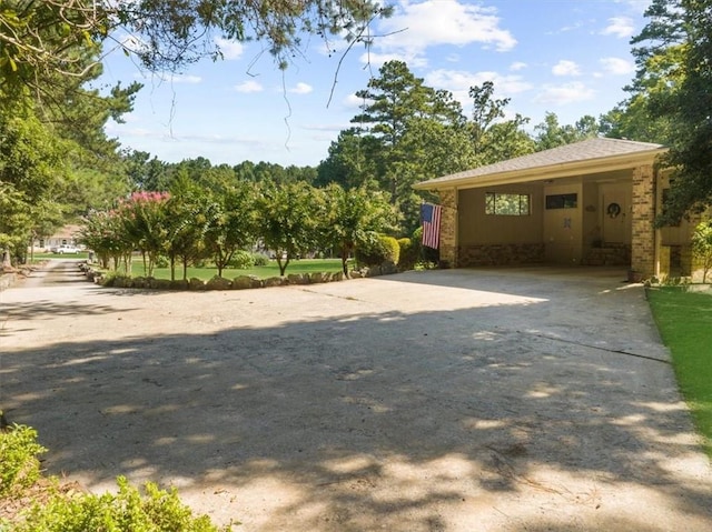 view of yard with a carport