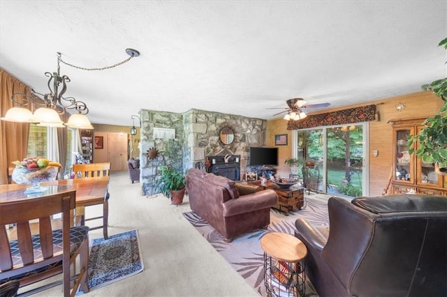 living room featuring light carpet and ceiling fan