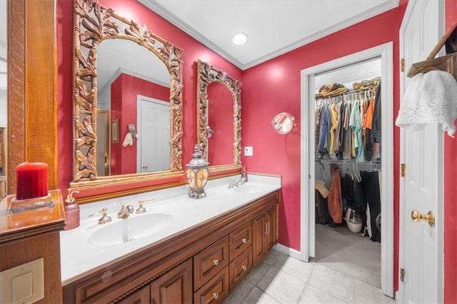 bathroom with vanity, crown molding, and tile patterned flooring