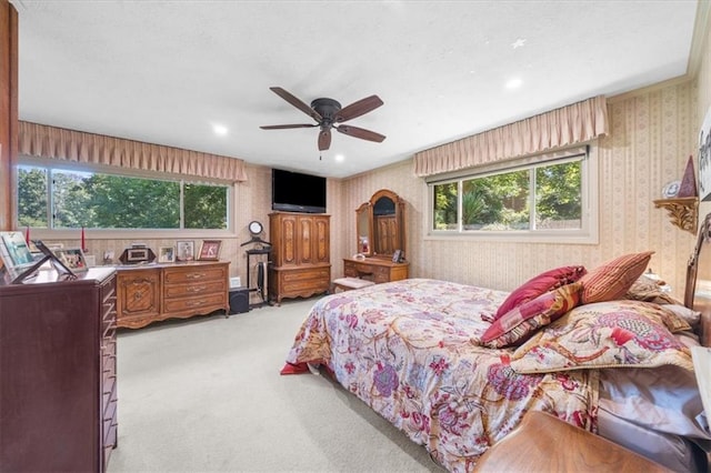 carpeted bedroom featuring ceiling fan