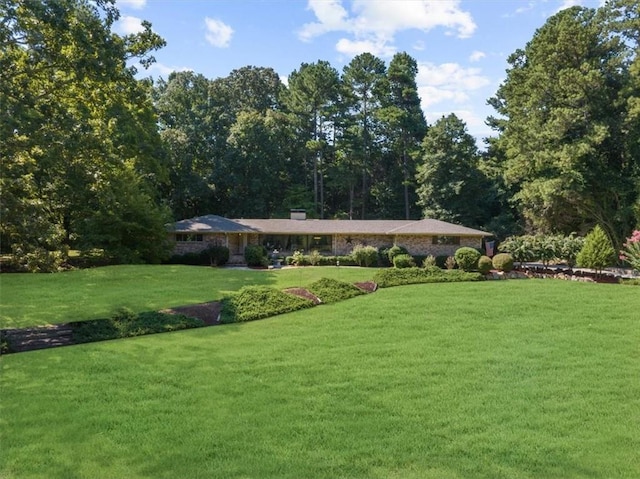 exterior space with a front lawn