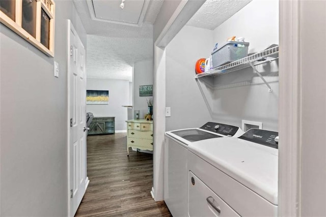 220 Brookstone Trl, Braselton, GA 30517 - laundry area featuring washer and dryer, a textured ceiling, and dark wood-style floors