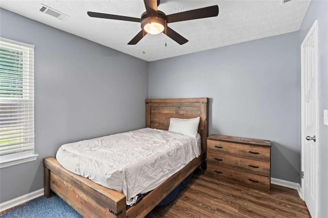 220 Brookstone Trl, Braselton, GA 30517 - bedroom featuring a textured ceiling and a ceiling fan