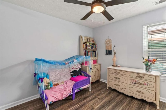 220 Brookstone Trl, Braselton, GA 30517 - bedroom featuring wood finished floors, a textured ceiling, and ceiling fan