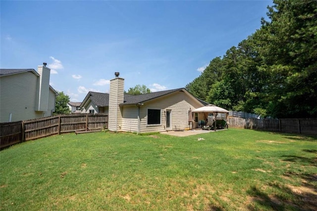 220 Brookstone Trl, Braselton, GA 30517 - back of property with a gazebo, a fenced backyard, and a patio