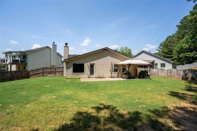 220 Brookstone Trl, Braselton, GA 30517 - rear view of property with a gazebo, a patio area, a fenced backyard, and a chimney
