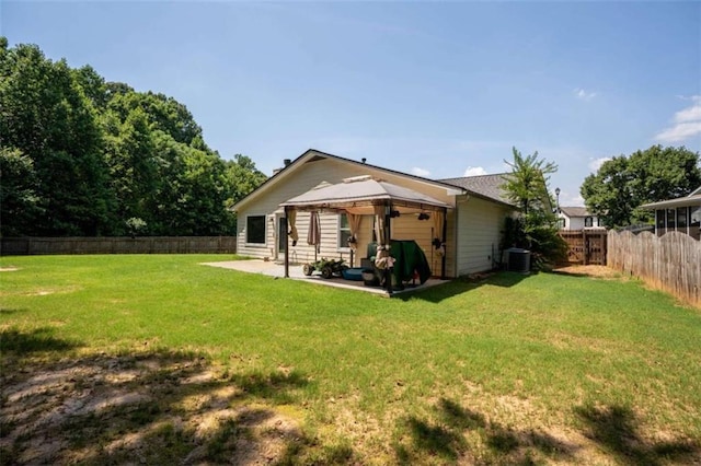 220 Brookstone Trl, Braselton, GA 30517 - back of property with a patio, a fenced backyard, and a gazebo