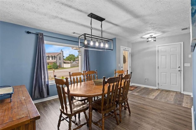 220 Brookstone Trl, Braselton, GA 30517 - dining area with wood finished floors and a textured ceiling