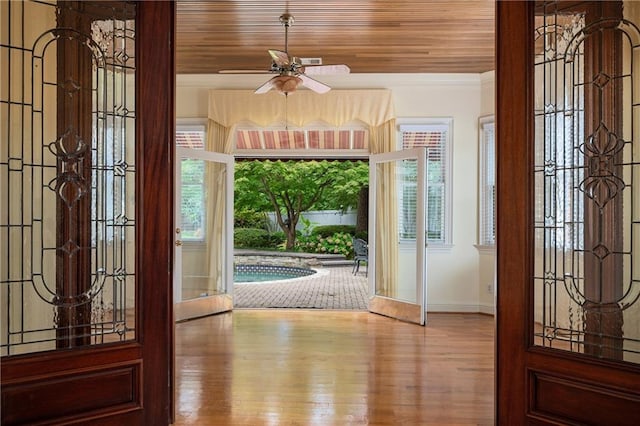 1006 Arbor Trce NE, Atlanta, GA 30319 - foyer featuring wood finished floors, ceiling fan, wooden ceiling, and crown molding