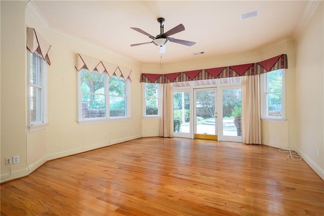1006 Arbor Trce NE, Atlanta, GA 30319 - spare room featuring light wood-type flooring, plenty of natural light, a ceiling fan, and ornamental molding