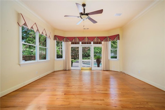 1006 Arbor Trce NE, Atlanta, GA 30319 - spare room with light wood finished floors, crown molding, and a ceiling fan