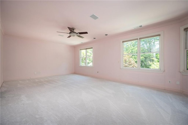 1006 Arbor Trce NE, Atlanta, GA 30319 - spare room featuring light carpet, ceiling fan, and crown molding