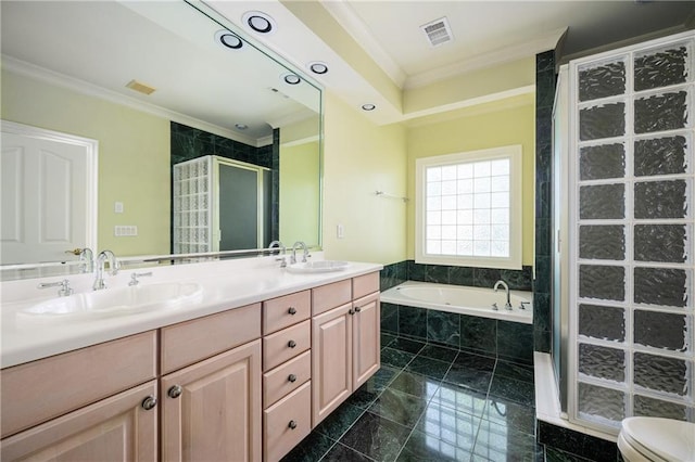 1006 Arbor Trce NE, Atlanta, GA 30319 - bathroom featuring crown molding, a shower stall, double vanity, and a garden tub