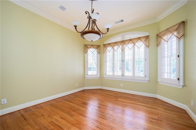 1006 Arbor Trce NE, Atlanta, GA 30319 - empty room featuring a chandelier, wood finished floors, and ornamental molding