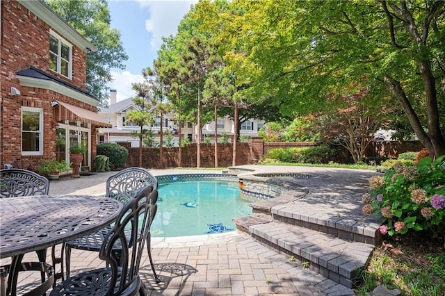1006 Arbor Trce NE, Atlanta, GA 30319 - view of swimming pool with an in-ground hot tub and a patio area